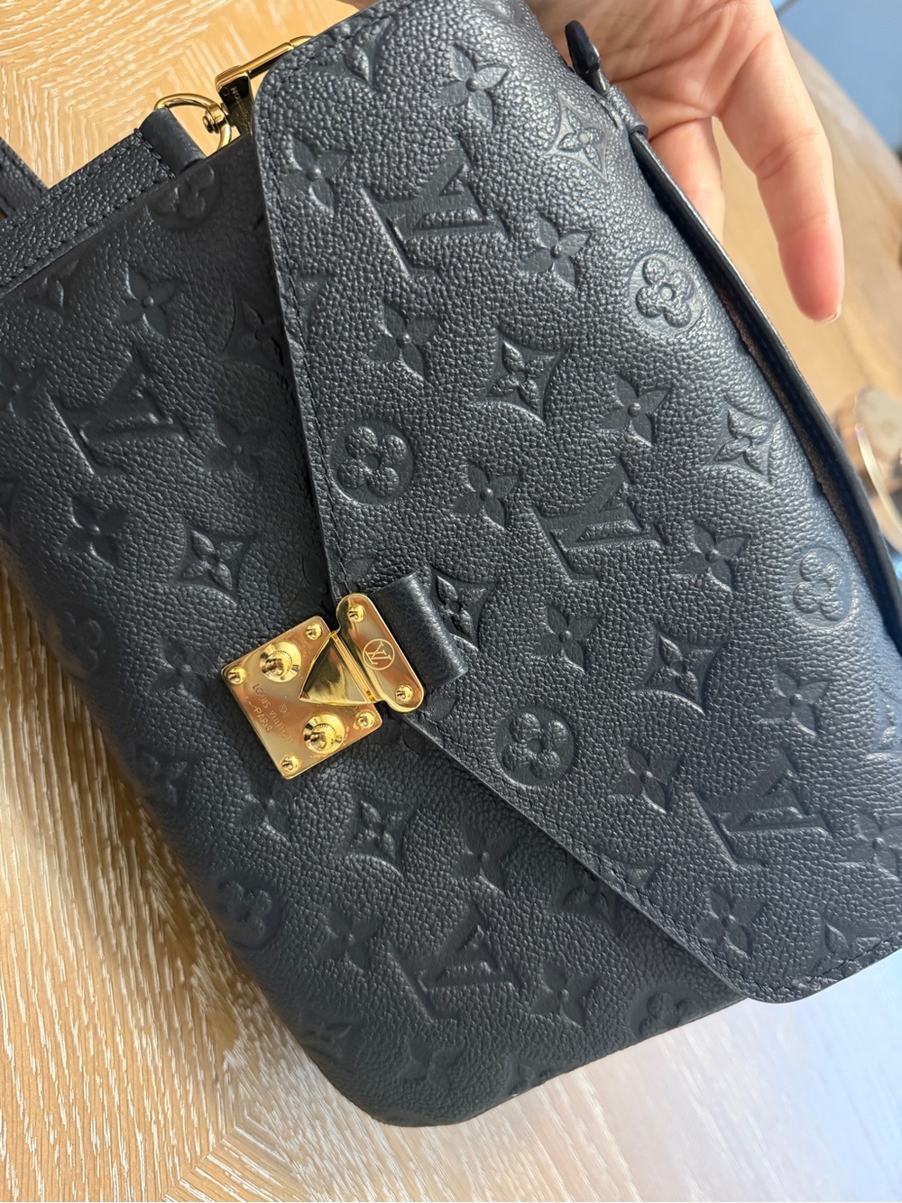 Authentic Louis Vuitton Pochette Métis in Black Monogram Empreinte leather